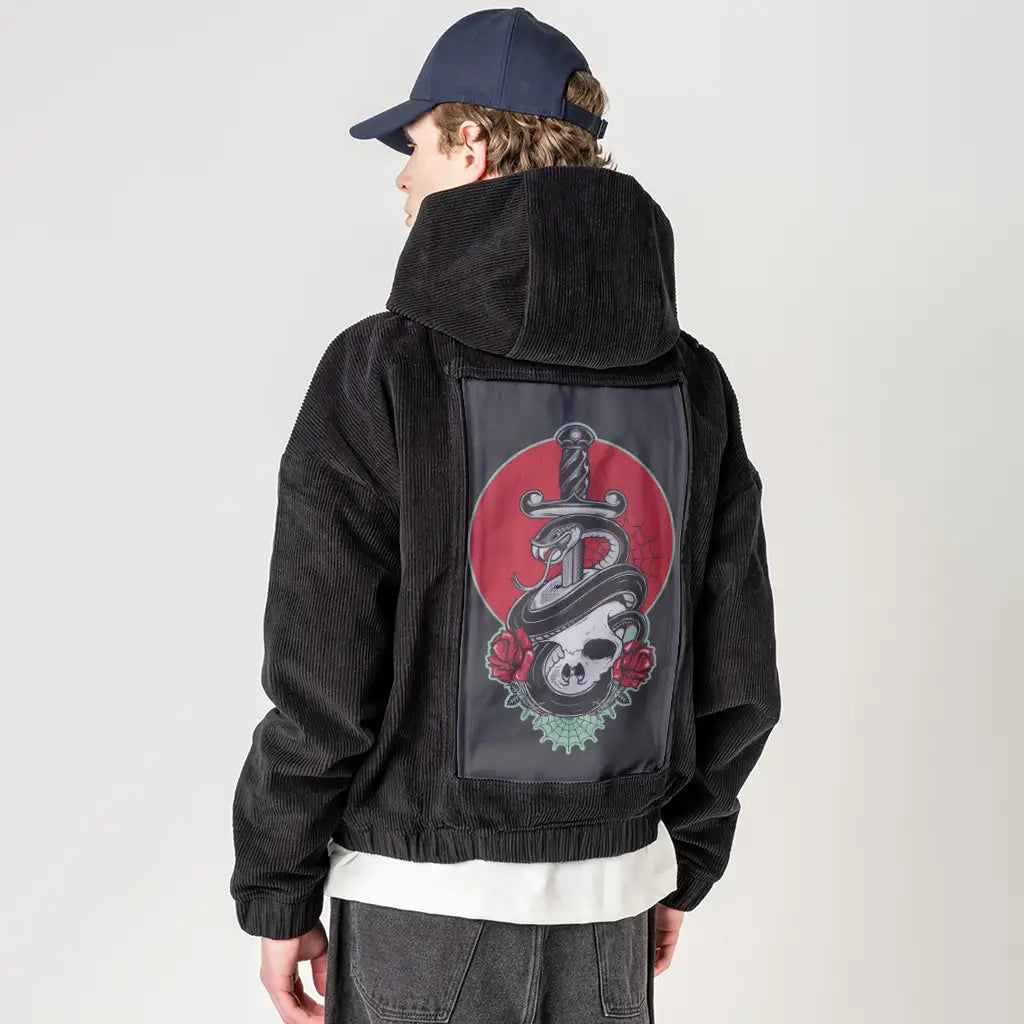 daggerskull patch on male retro cord hoodie in onyx
