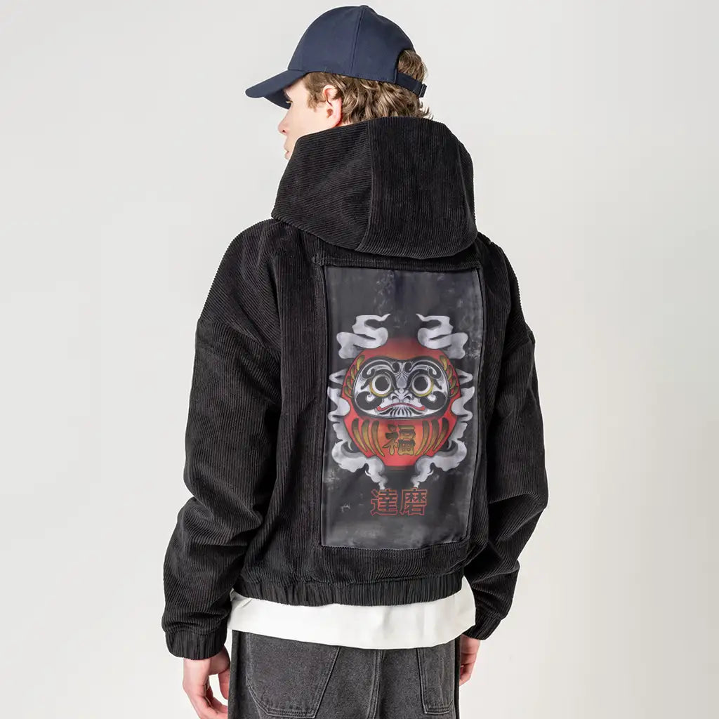 darkdaruma patch on male retro cord hoodie in onyx