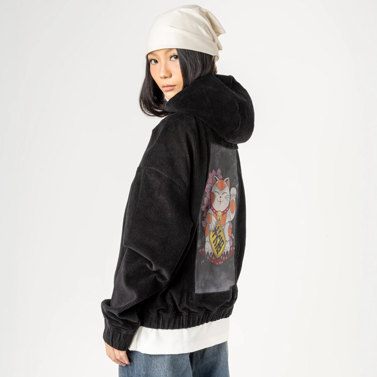 darkluckycat patch on female retro cord hoodie in onyx