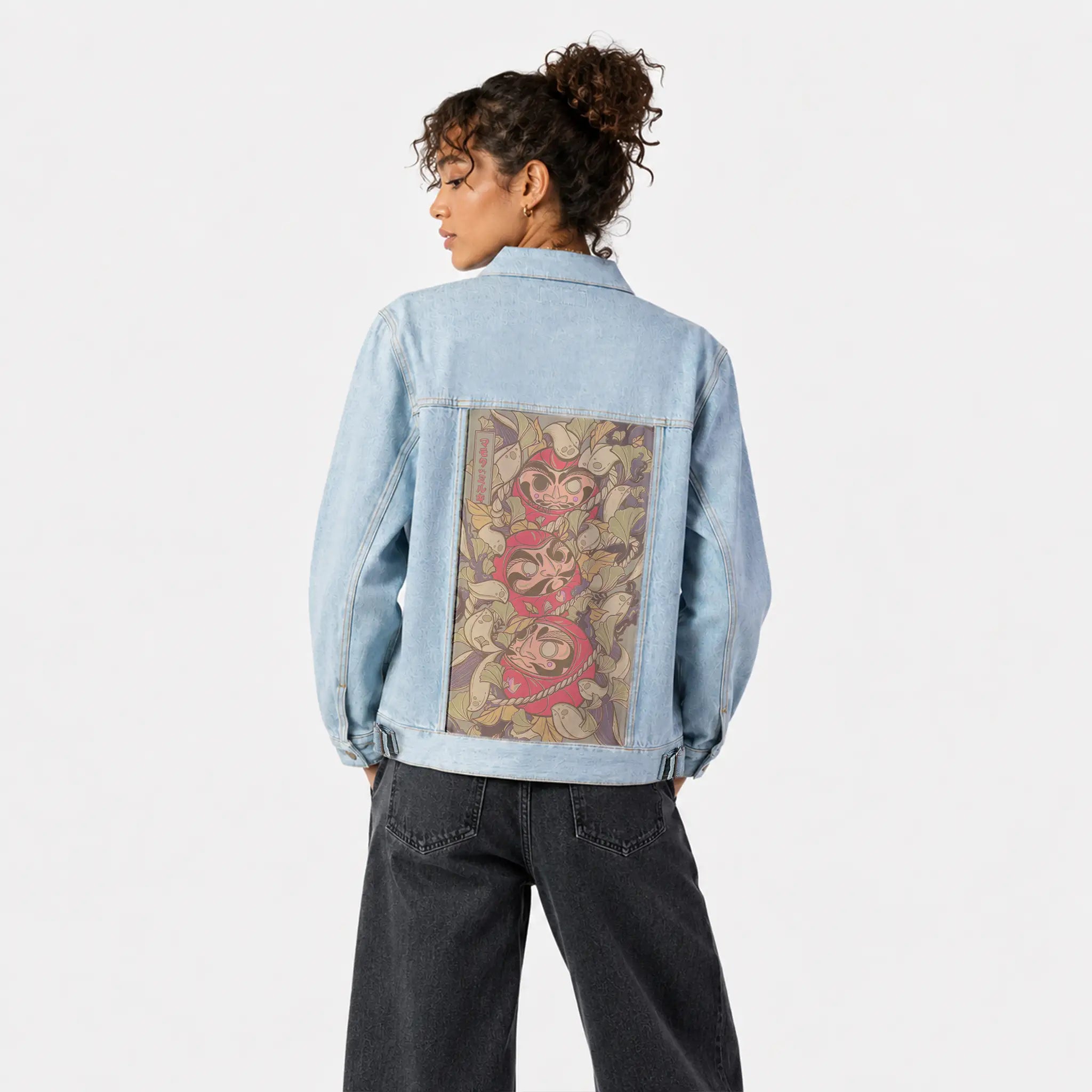 darumatrio patch on female og denim jacket in oceanside