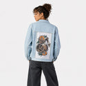 deadbeforedecaf patch on female og denim jacket in oceanside
