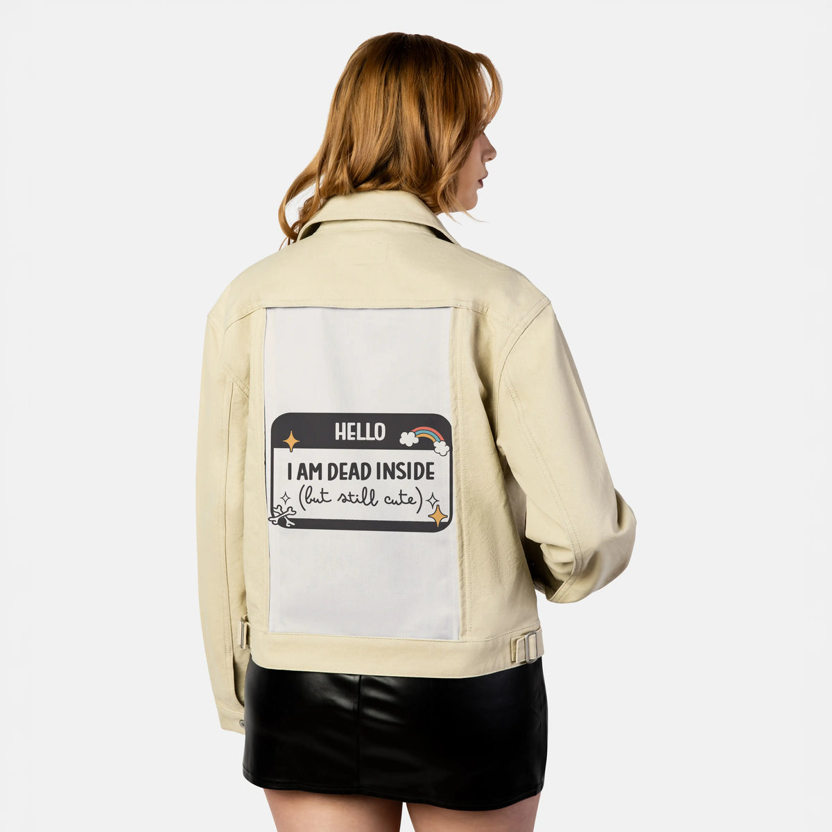 deadbutcute patch on female atelier canvas jacket in tan