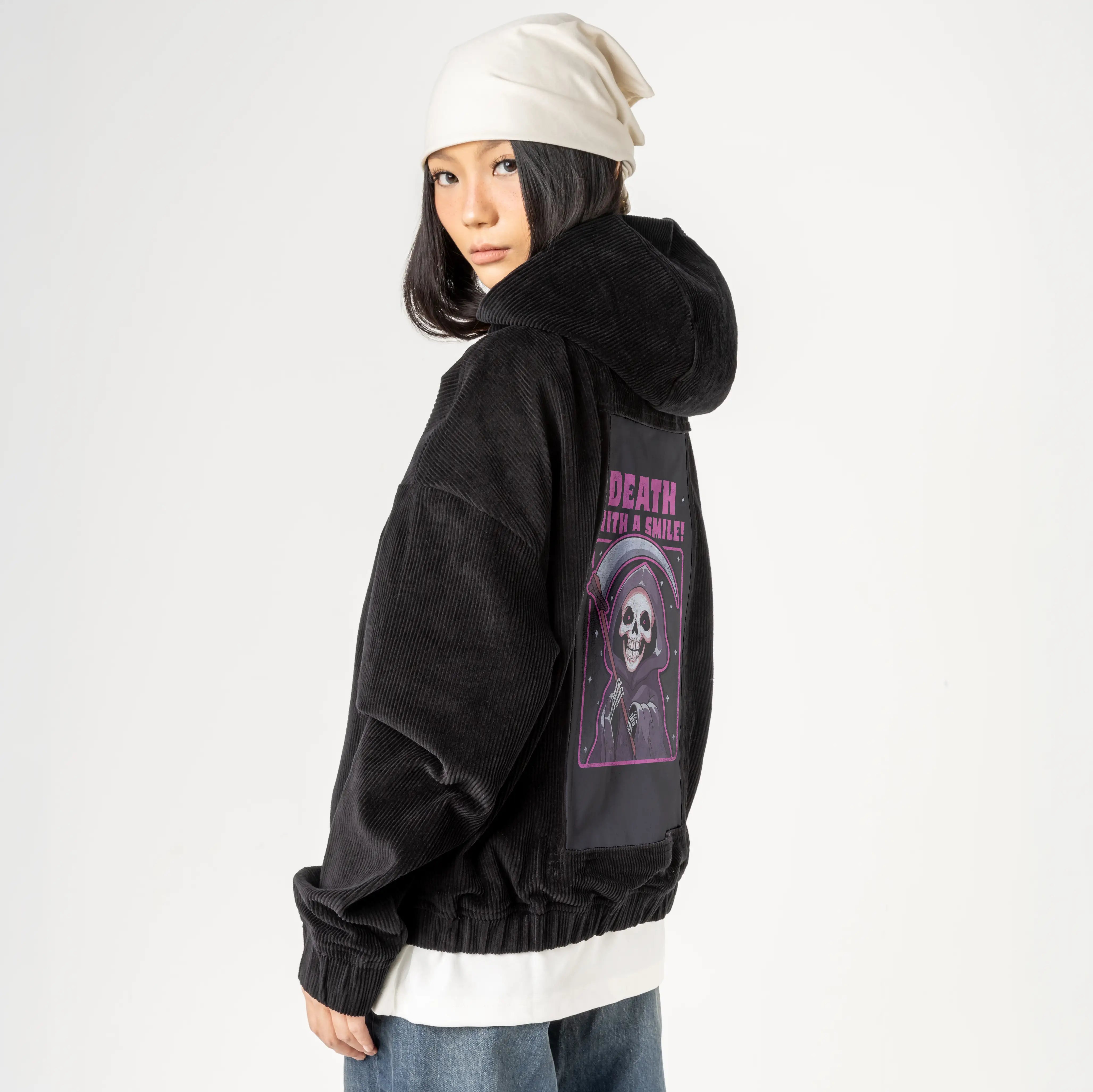 deathwithasmile patch on female retro cord hoodie in onyx