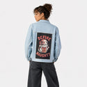 definenaughty patch on female og denim jacket in oceanside
