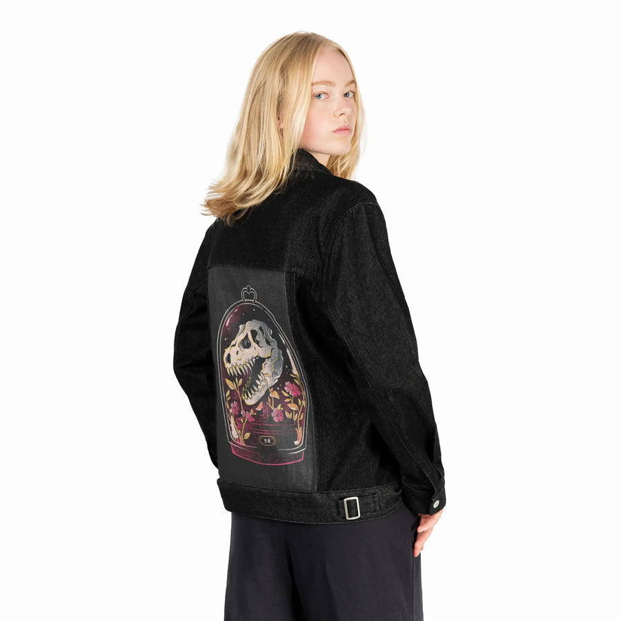 dinorelic patch on female og denim jacket in raven