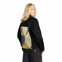 disbursal patch on female og denim jacket in raven