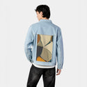 disbursal patch on male og denim jacket in oceanside