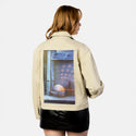 discoball patch on female atelier canvas jacket in tan