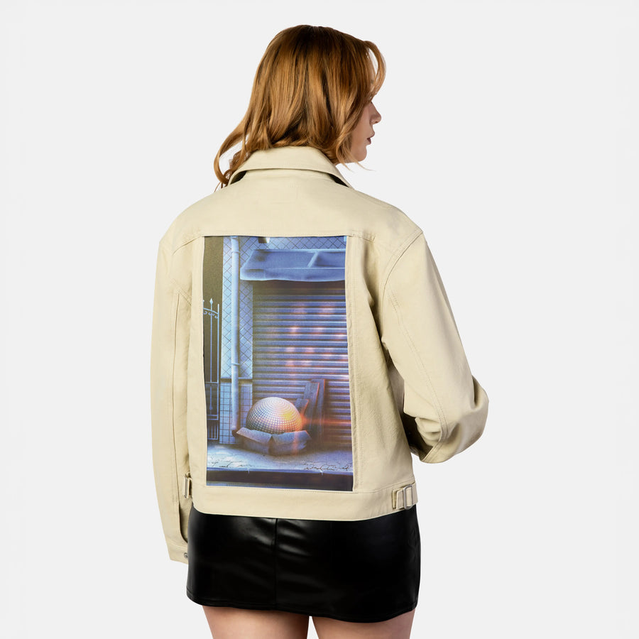 discoball patch on female atelier canvas jacket in tan