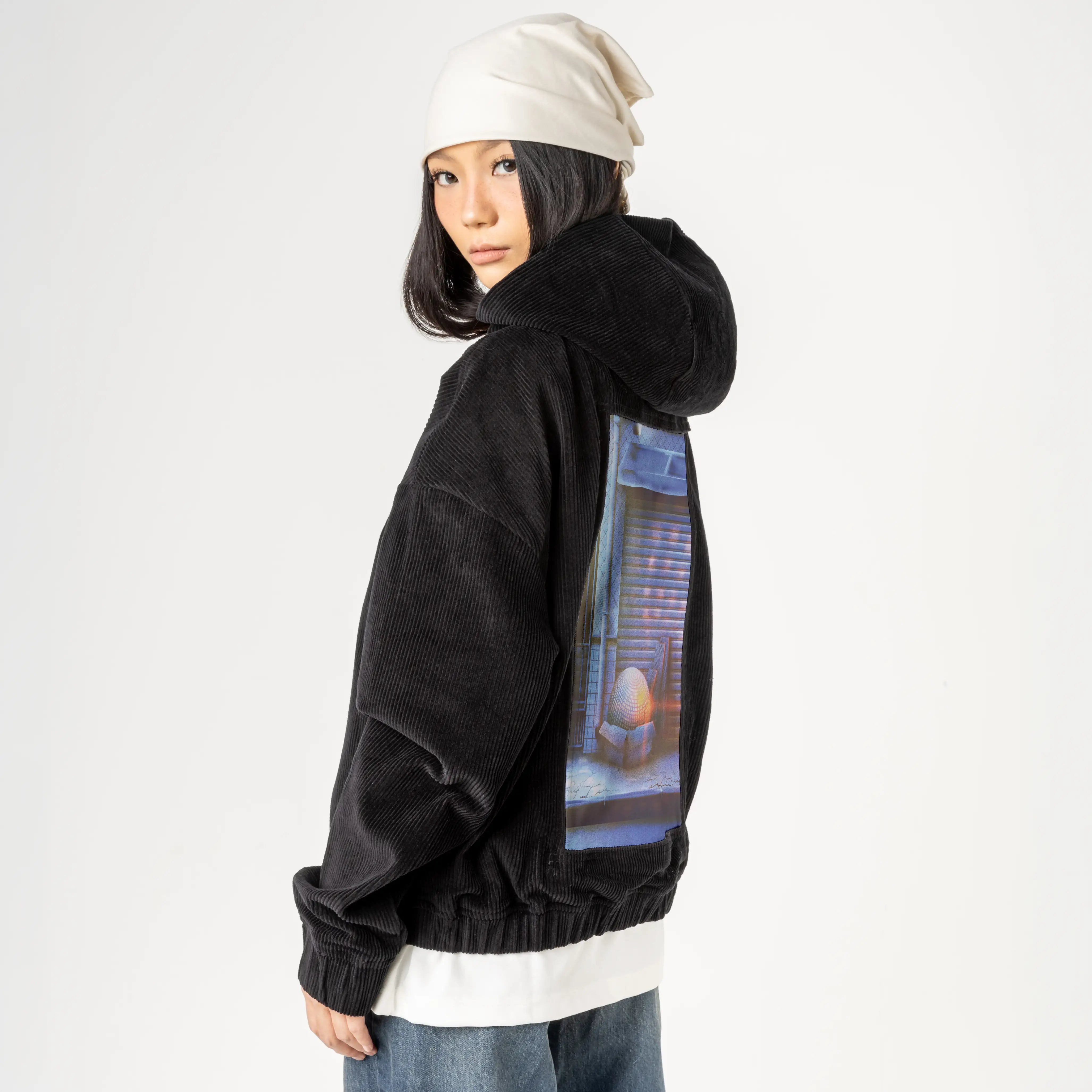 discoball patch on female retro cord hoodie in onyx