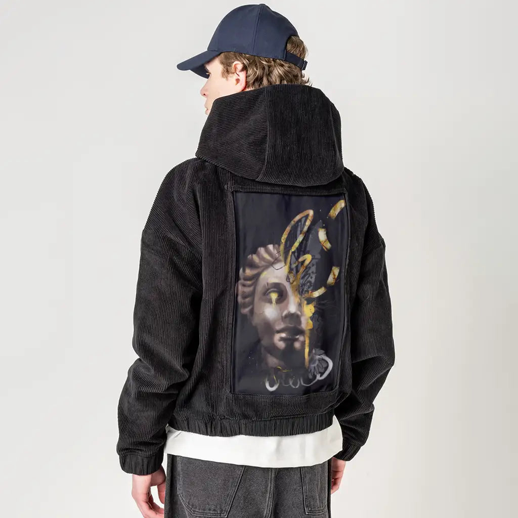 divinelyreimagined patch on male retro cord hoodie in onyx