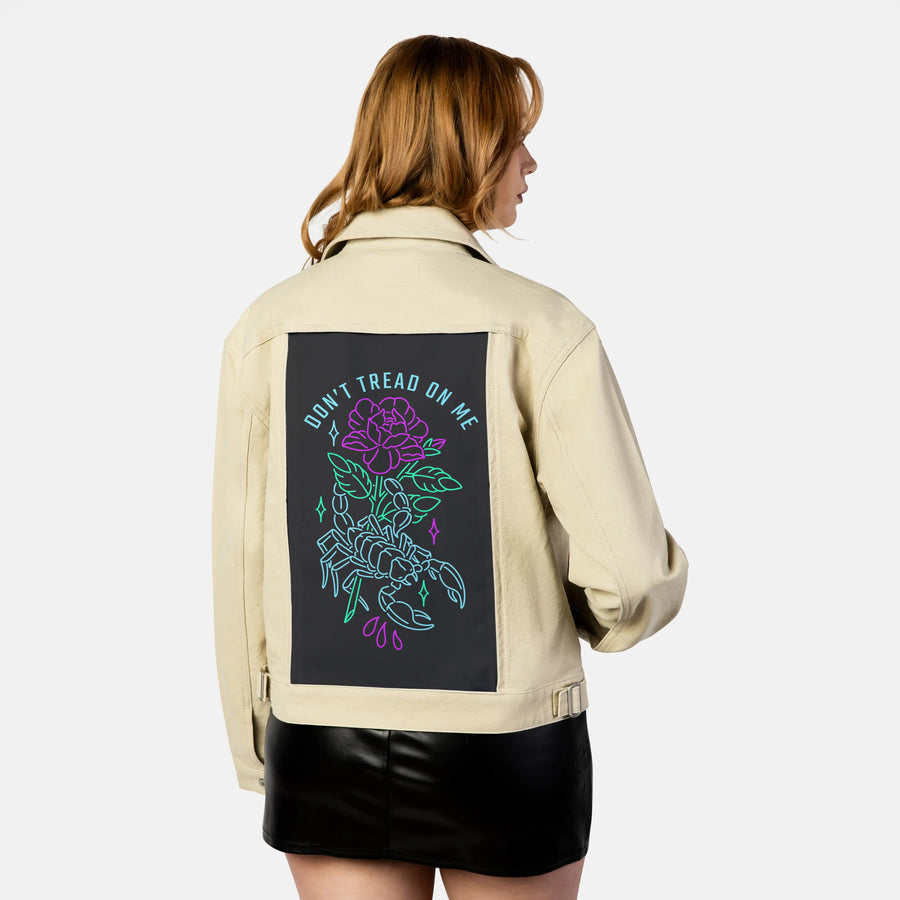 donttreadonme patch on female atelier canvas jacket in tan