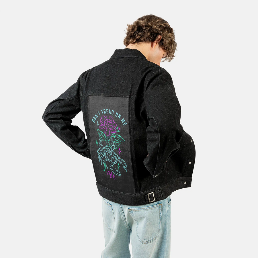 donttreadonme patch on male og denim jacket in raven