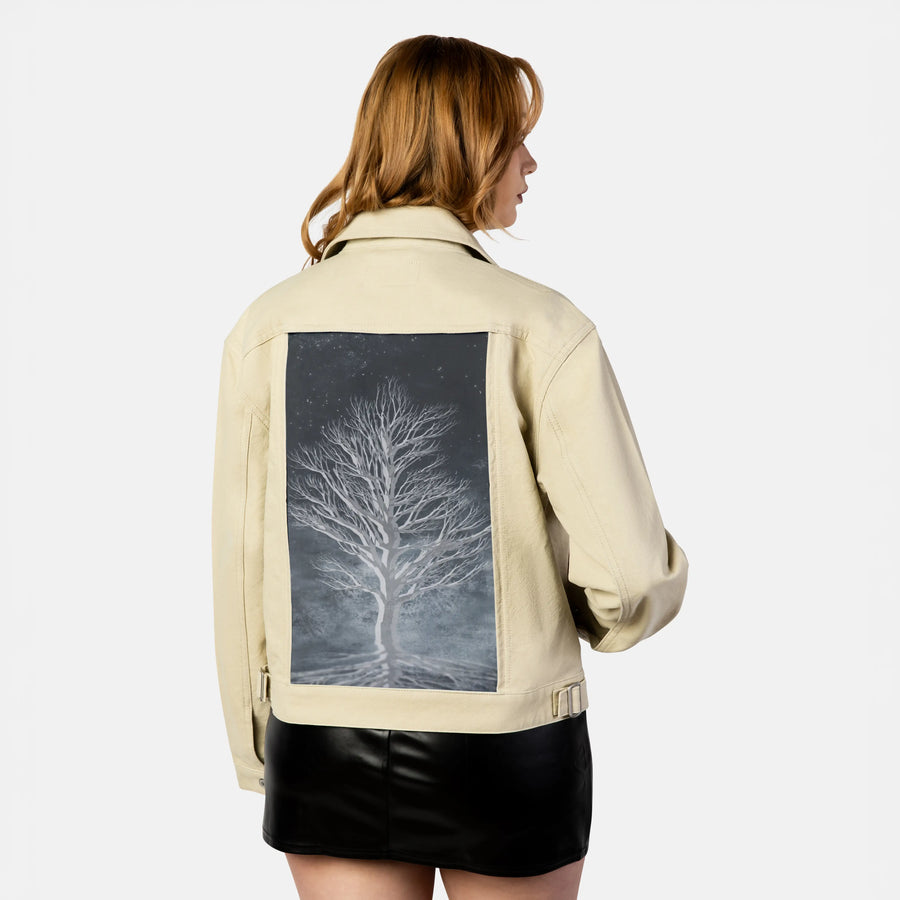 dreamtree patch on female atelier canvas jacket in tan