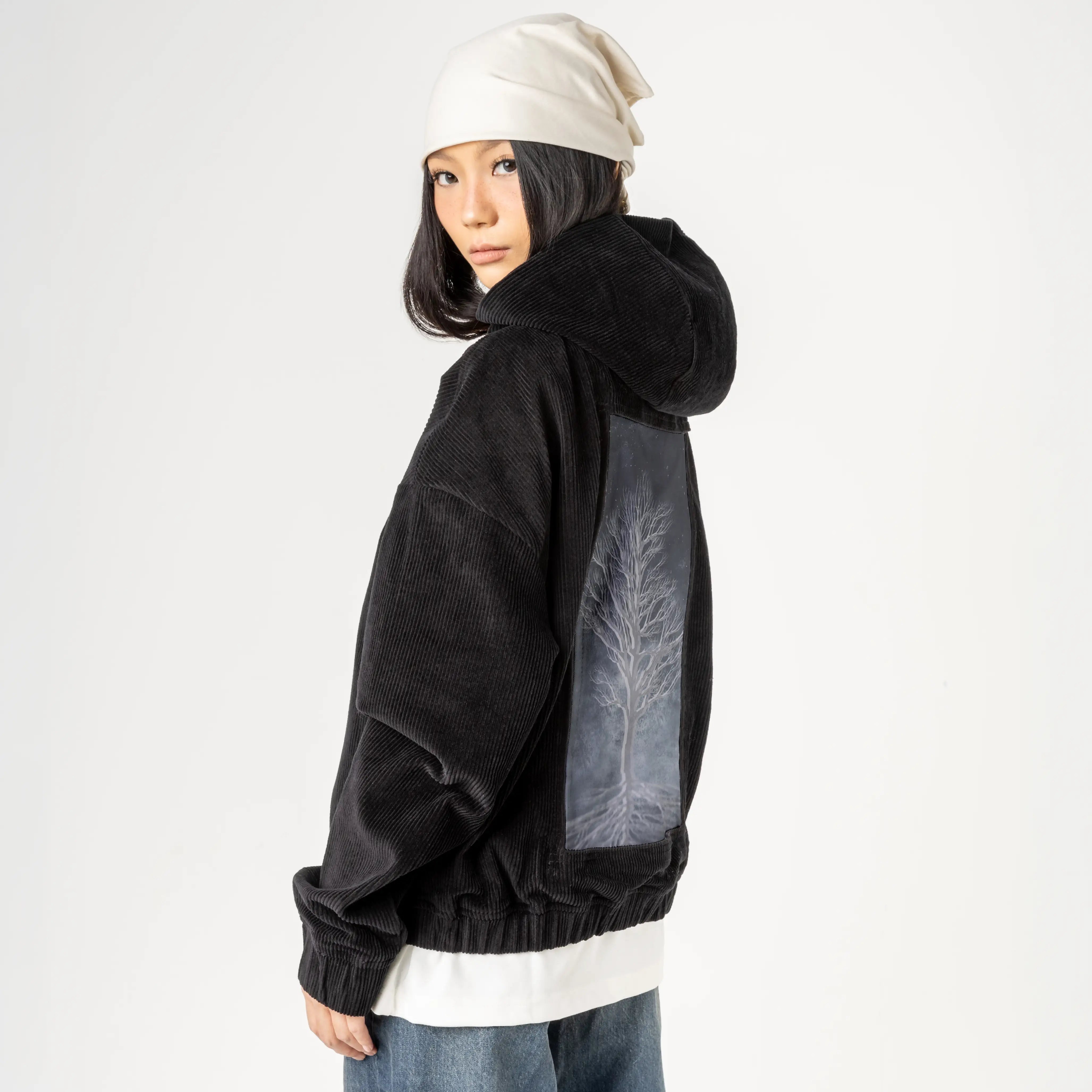 dreamtree patch on female retro cord hoodie in onyx