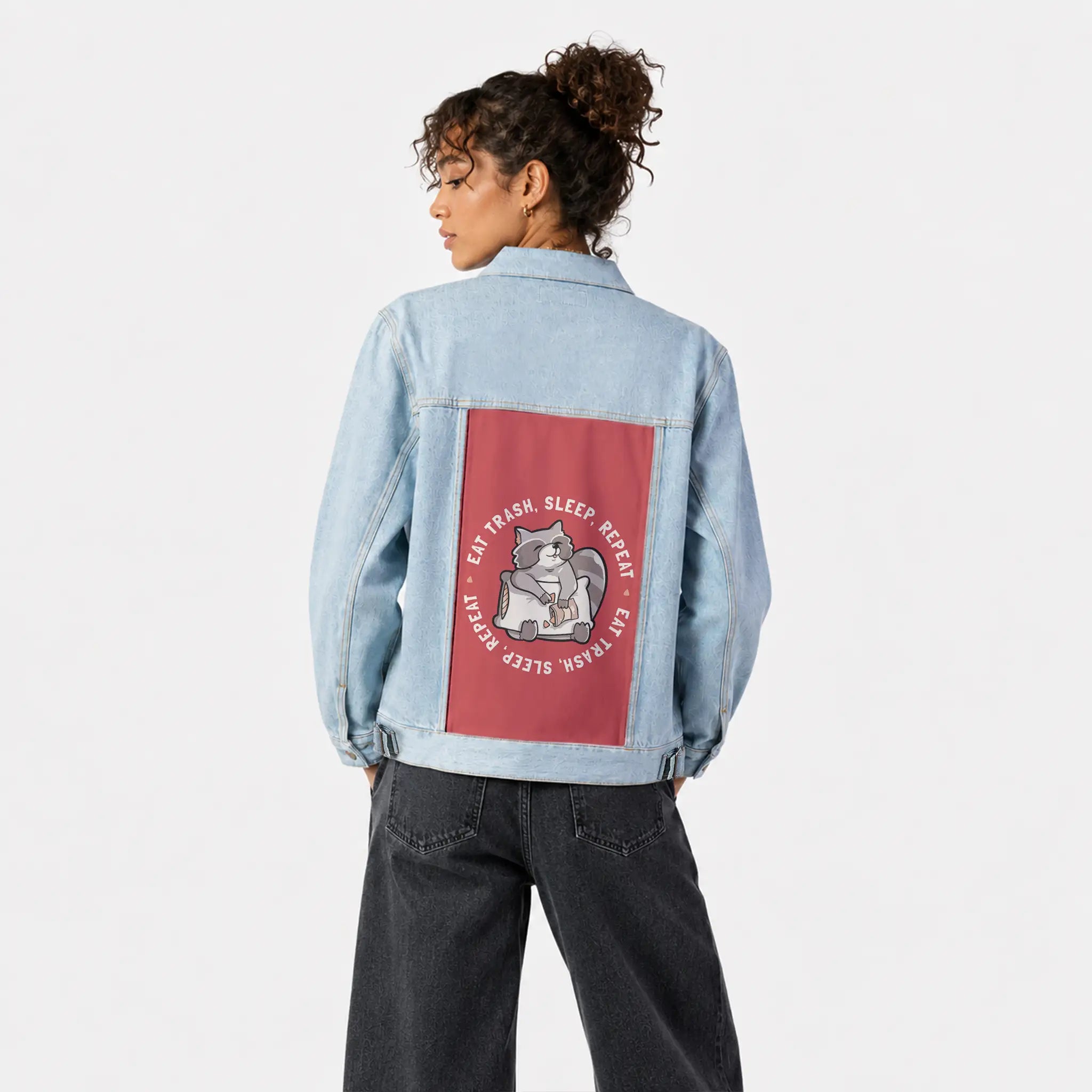 eattrash patch on female og denim jacket in oceanside