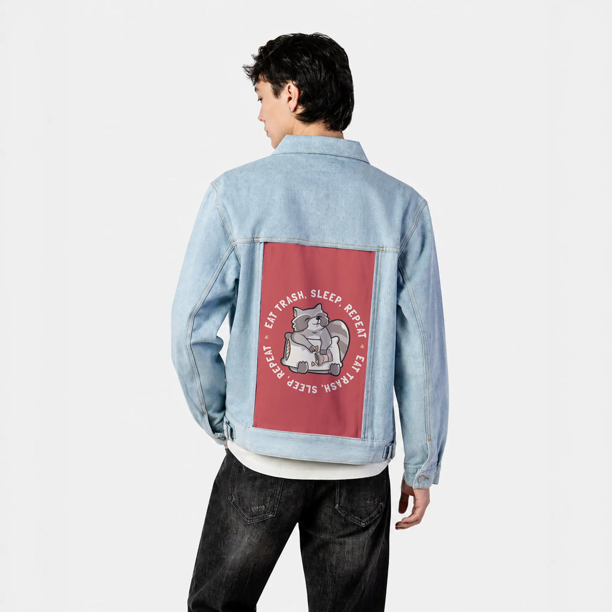 eattrash patch on male og denim jacket in oceanside