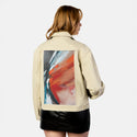echoofthewild patch on female atelier canvas jacket in tan