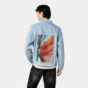 echoofthewild patch on male og denim jacket in oceanside