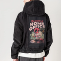 Person wearing a black jacket with a graphic design on the back, standing against a plain background