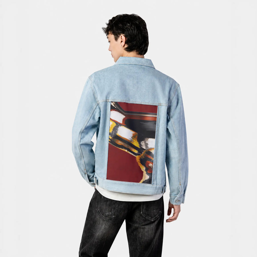 emberinmotion patch on male og denim jacket in oceanside