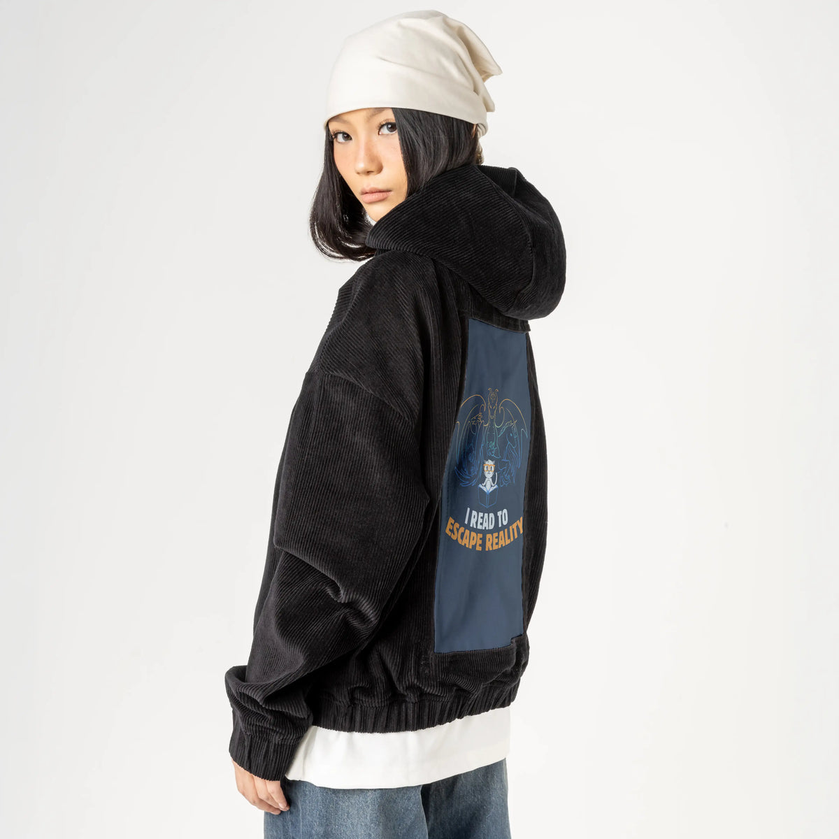 escapereality patch on female retro cord hoodie in onyx