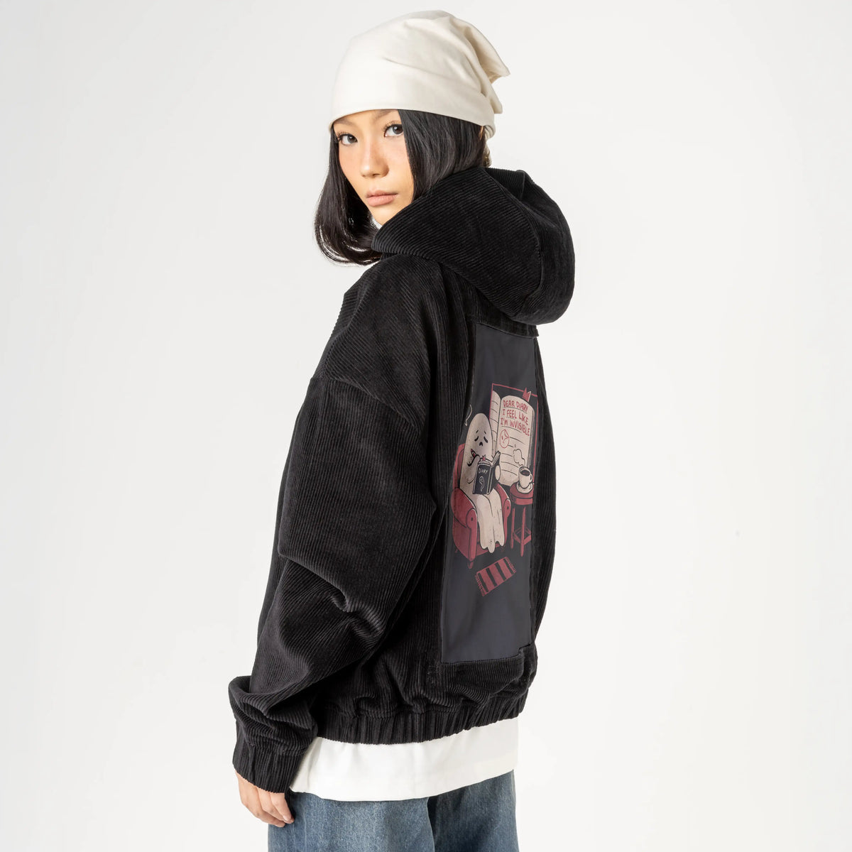 feelinginvisible patch on female retro cord hoodie in onyx