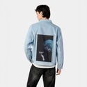 floatingastronaut patch on male og denim jacket in oceanside