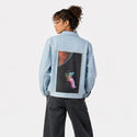 floatinginspace patch on female og denim jacket in oceanside
