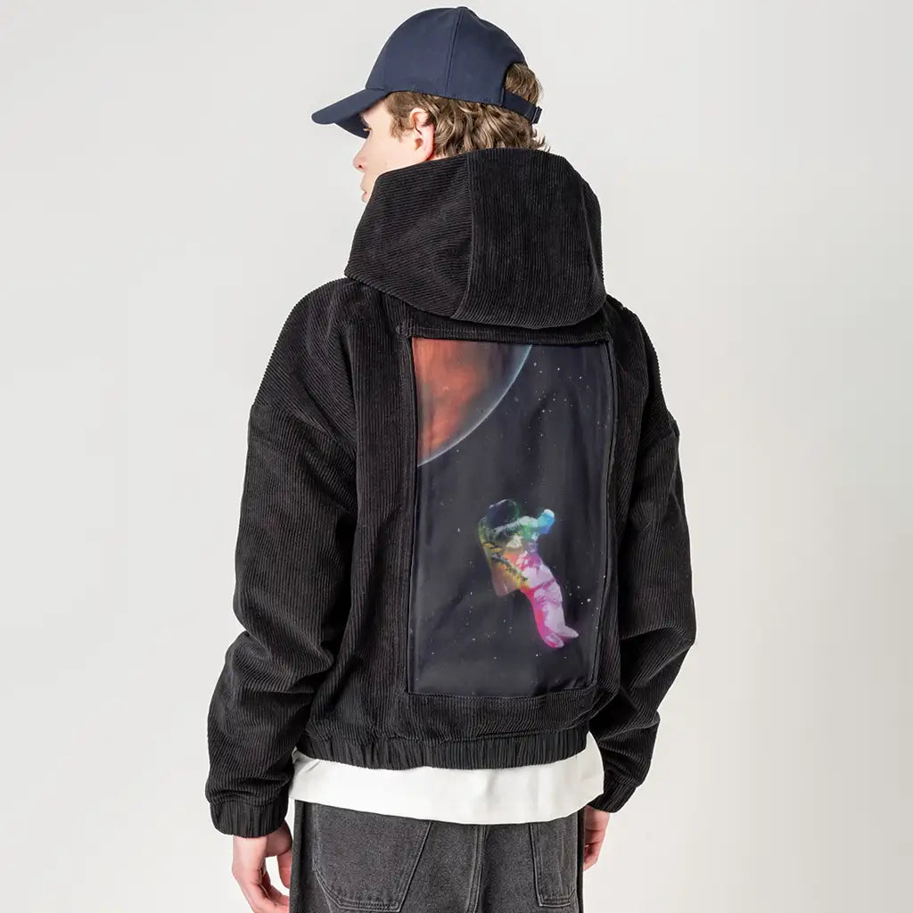 floatinginspace patch on male retro cord hoodie in onyx