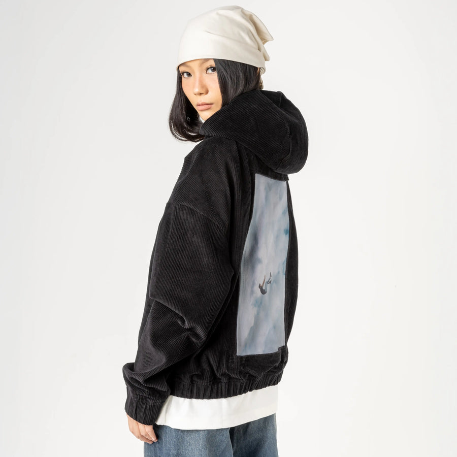 freefall patch on female retro cord hoodie in onyx