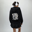 ghostlysquad patch on female essential zip hoodie in after hours