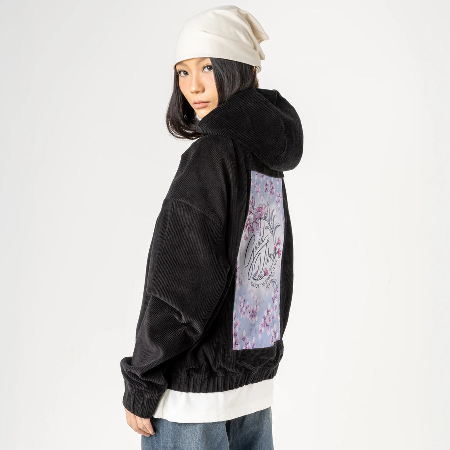 goodvibes patch on female retro cord hoodie in onyx