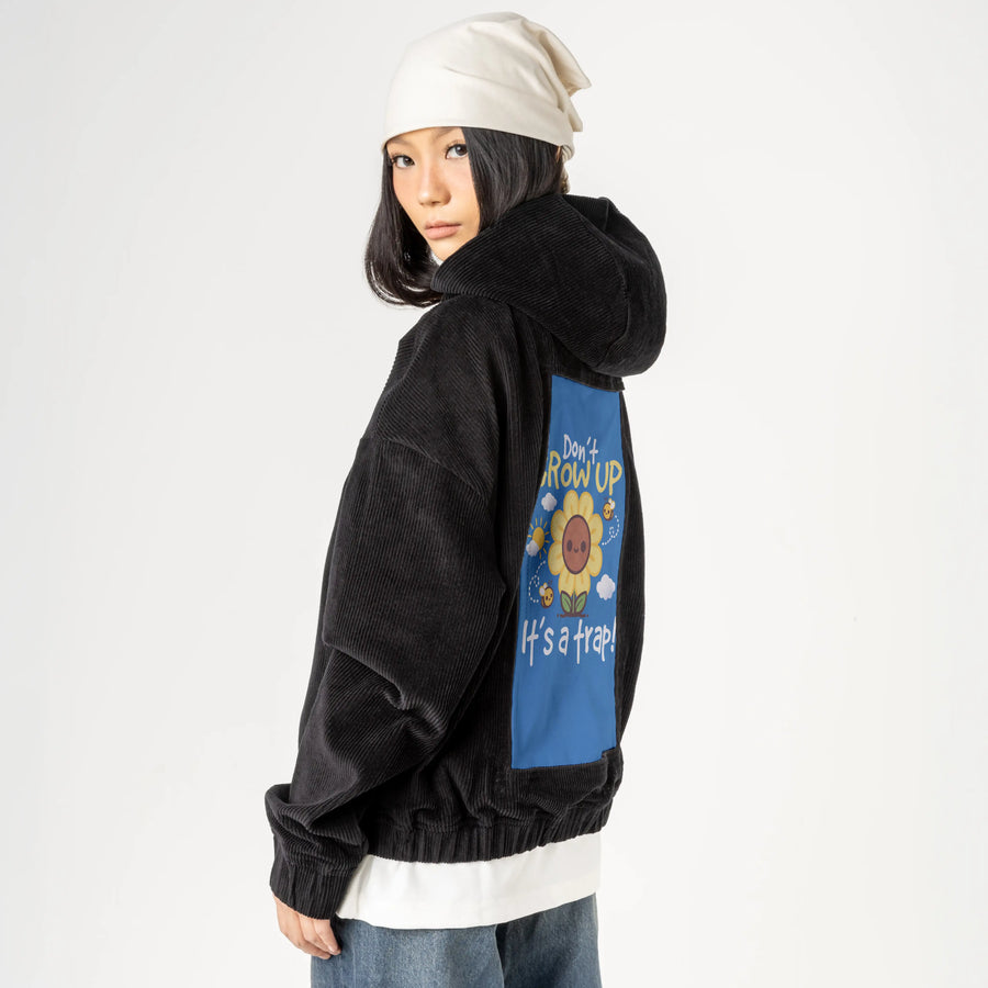 growingup patch on female retro cord hoodie in onyx