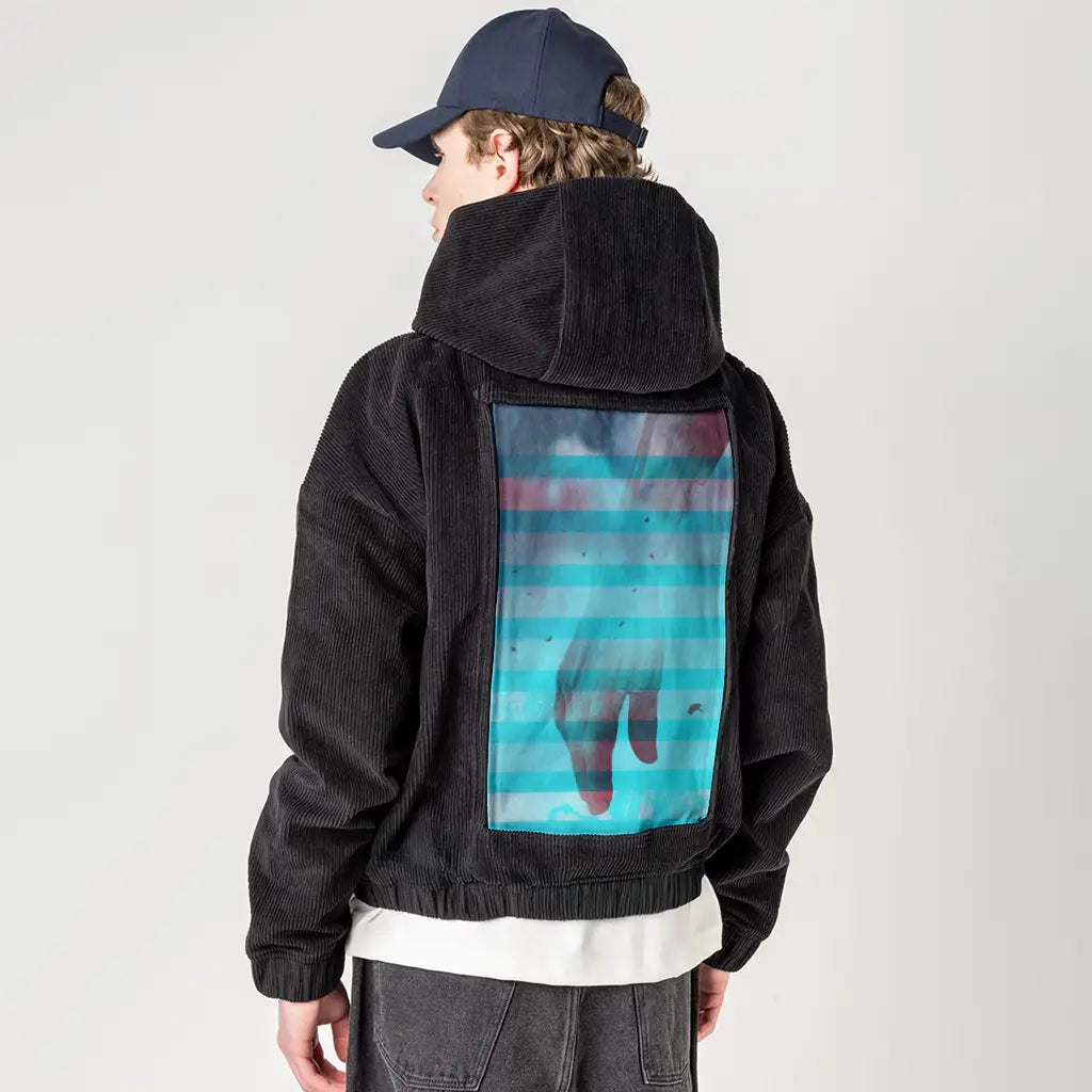 handscapecaress patch on male retro cord hoodie in onyx