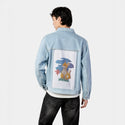 happiness patch on male og denim jacket in oceanside