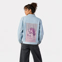 happy patch on female og denim jacket in oceanside