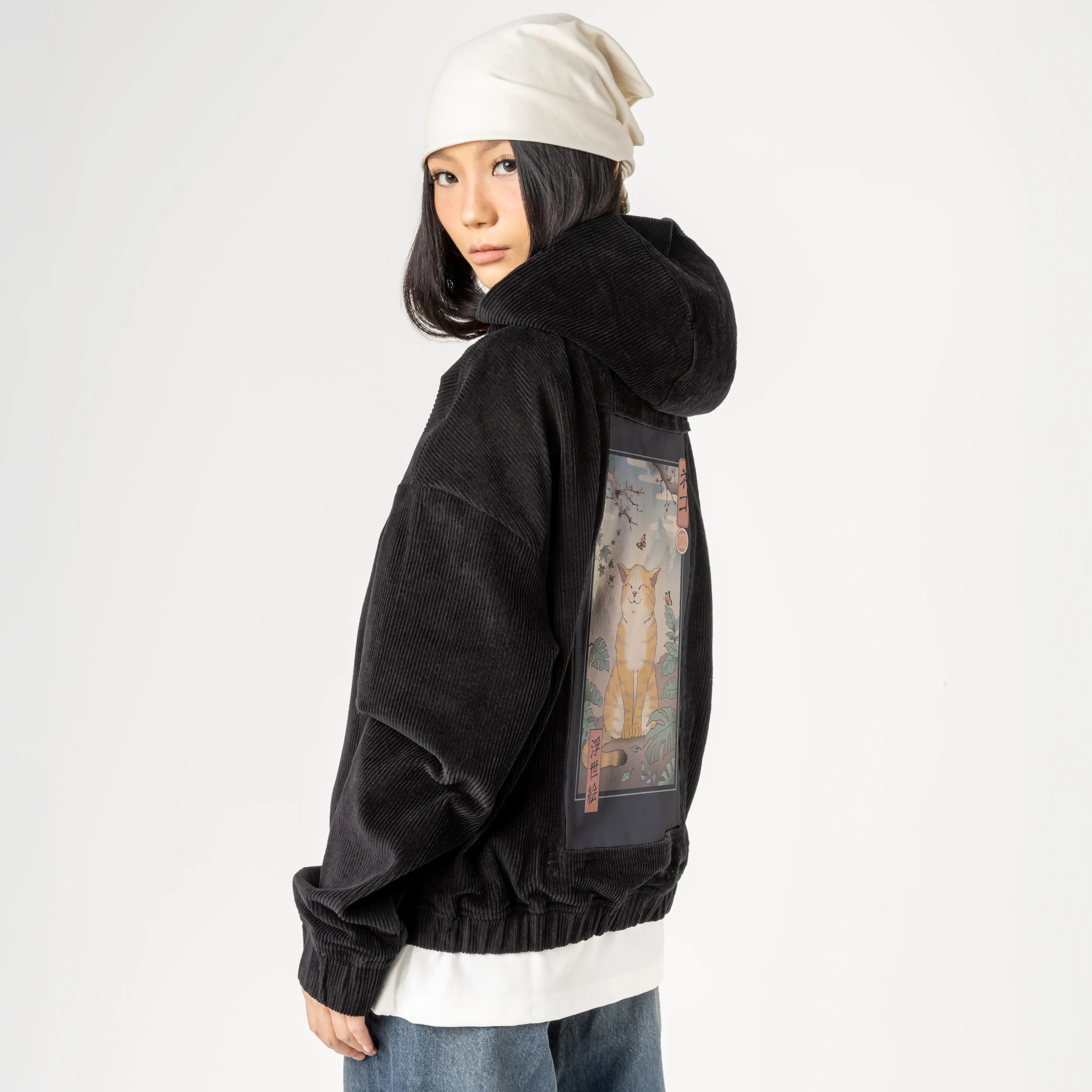 happyedocat patch on female retro cord hoodie in onyx