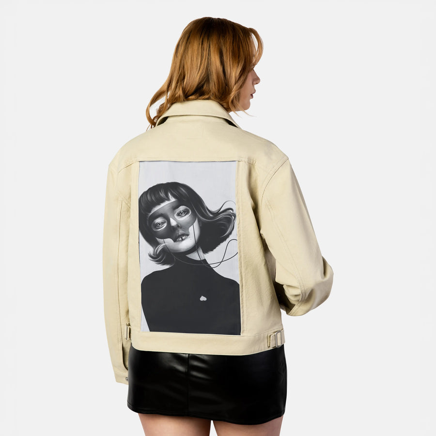 haunting patch on female atelier canvas jacket in tan