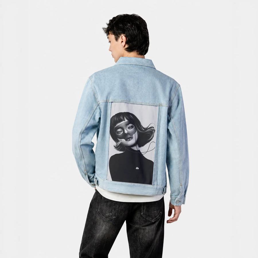 haunting patch on male og denim jacket in oceanside