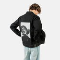haunting patch on male og denim jacket in raven