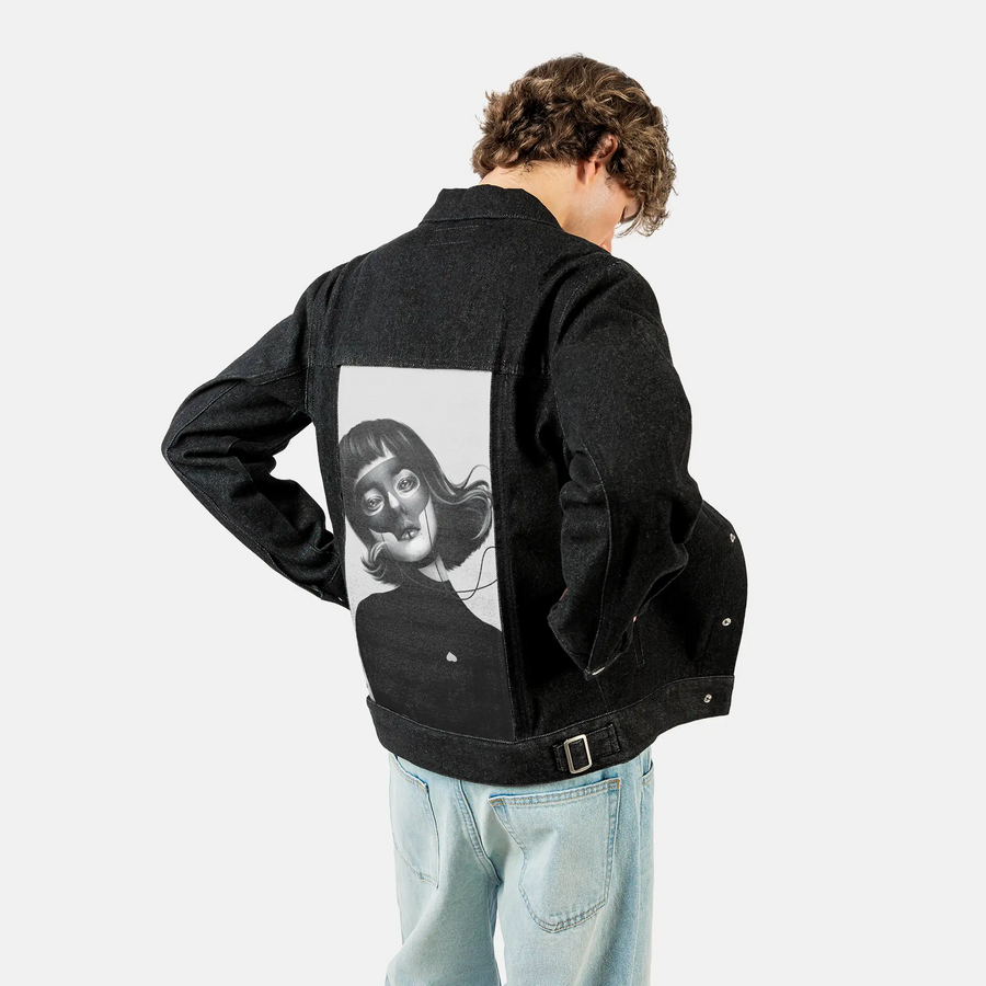 haunting patch on male og denim jacket in raven