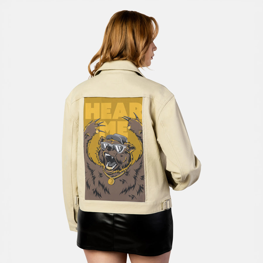 hearmeroar patch on female atelier canvas jacket in tan