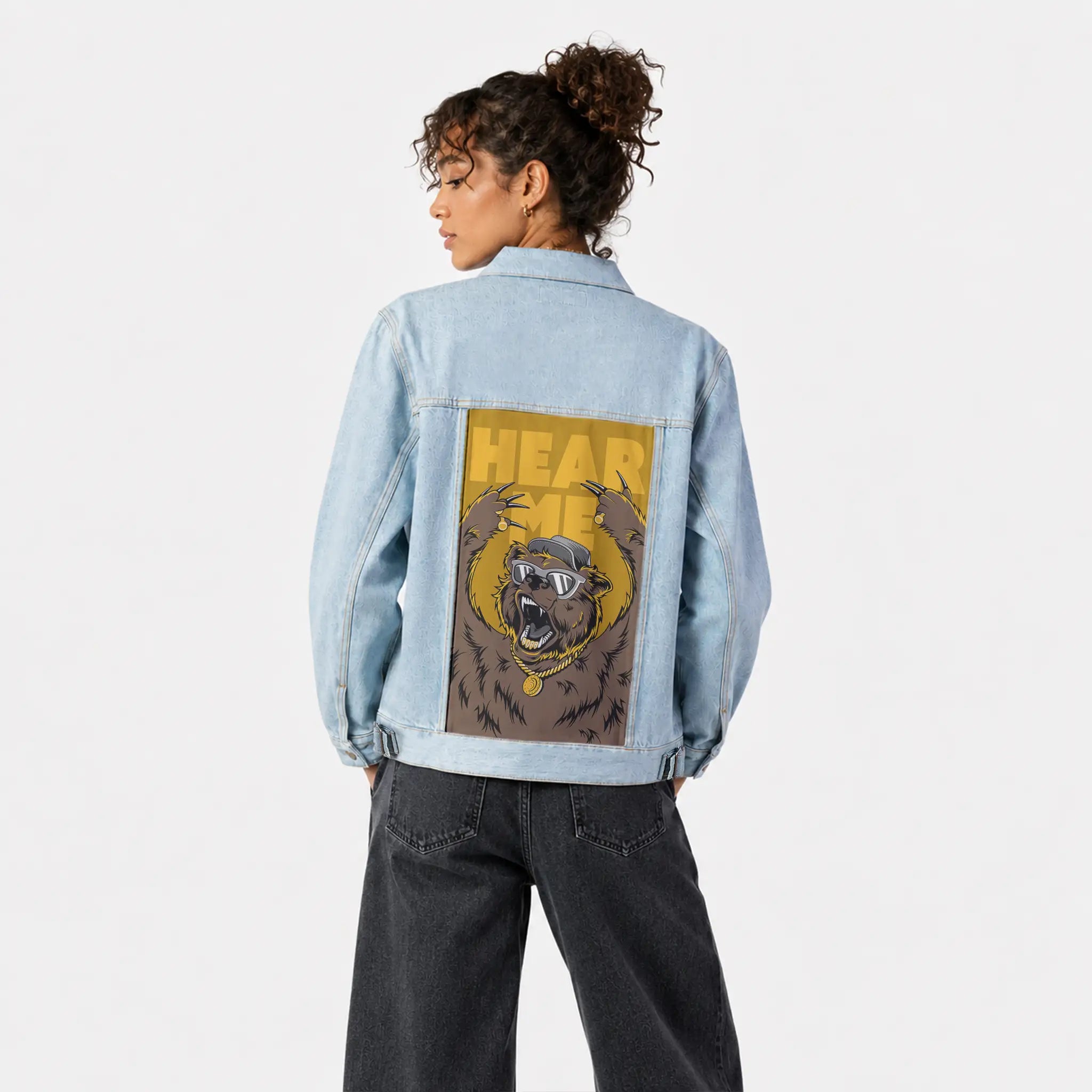 hearmeroar patch on female og denim jacket in oceanside