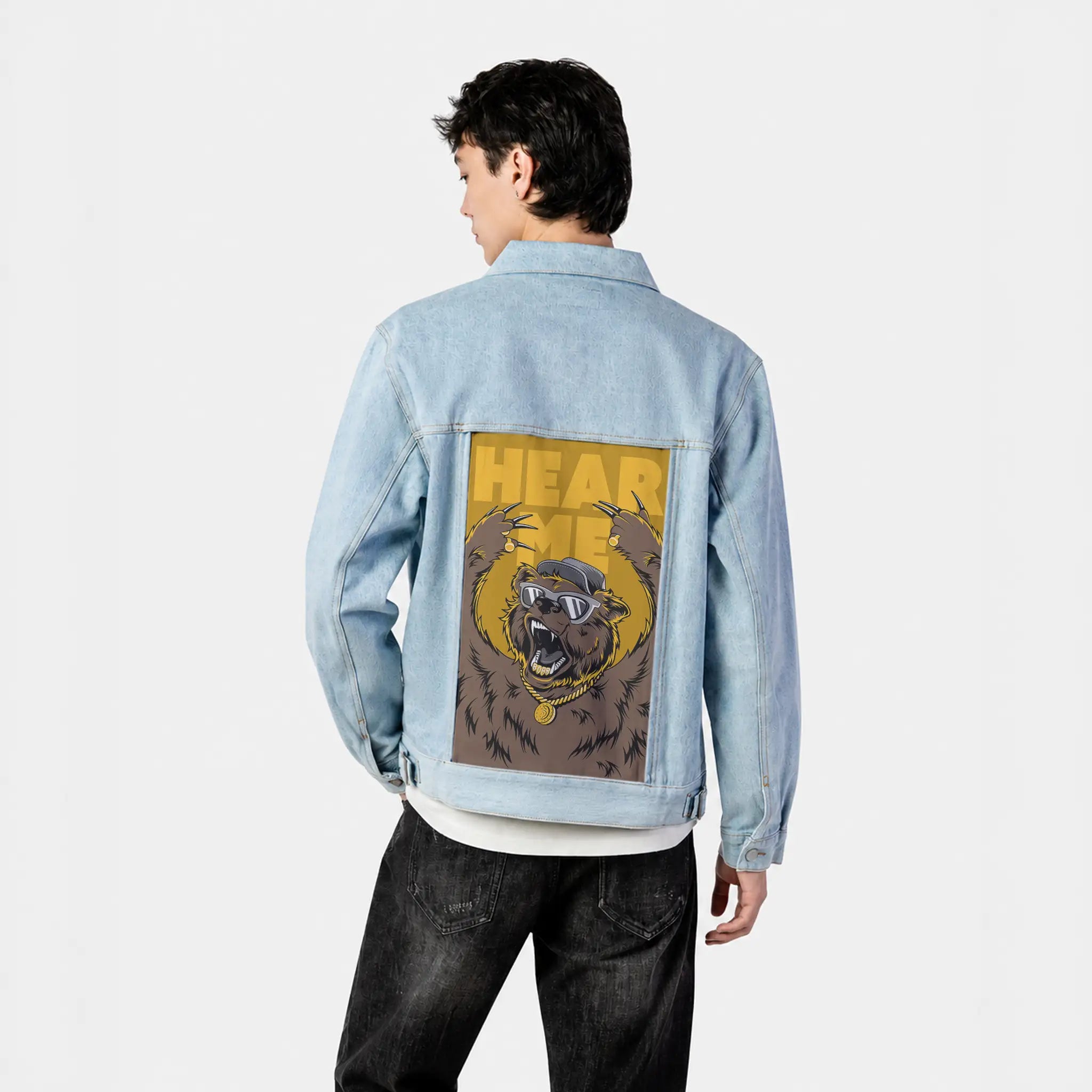 hearmeroar patch on male og denim jacket in oceanside