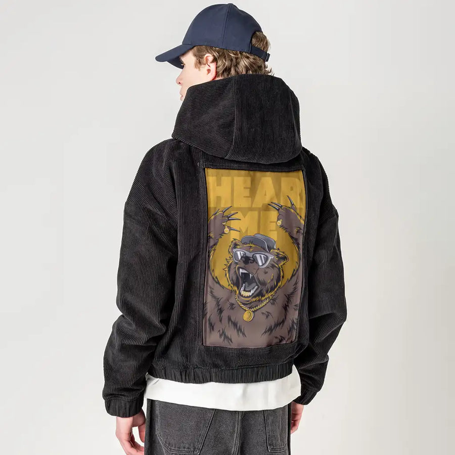 hearmeroar patch on male retro cord hoodie in onyx