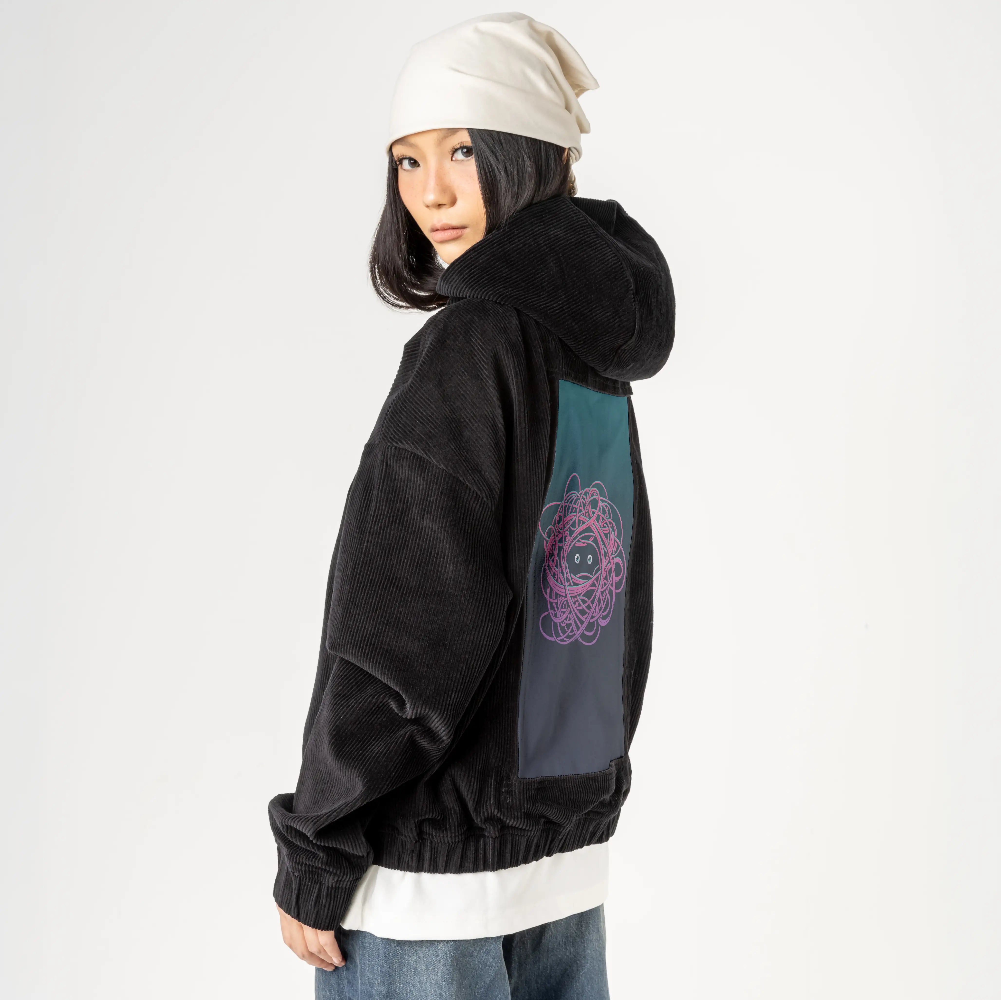 hidden patch on female retro cord hoodie in onyx