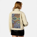 hypertapestry patch on female atelier canvas jacket in tan