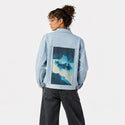 imaginaryworld patch on female og denim jacket in oceanside