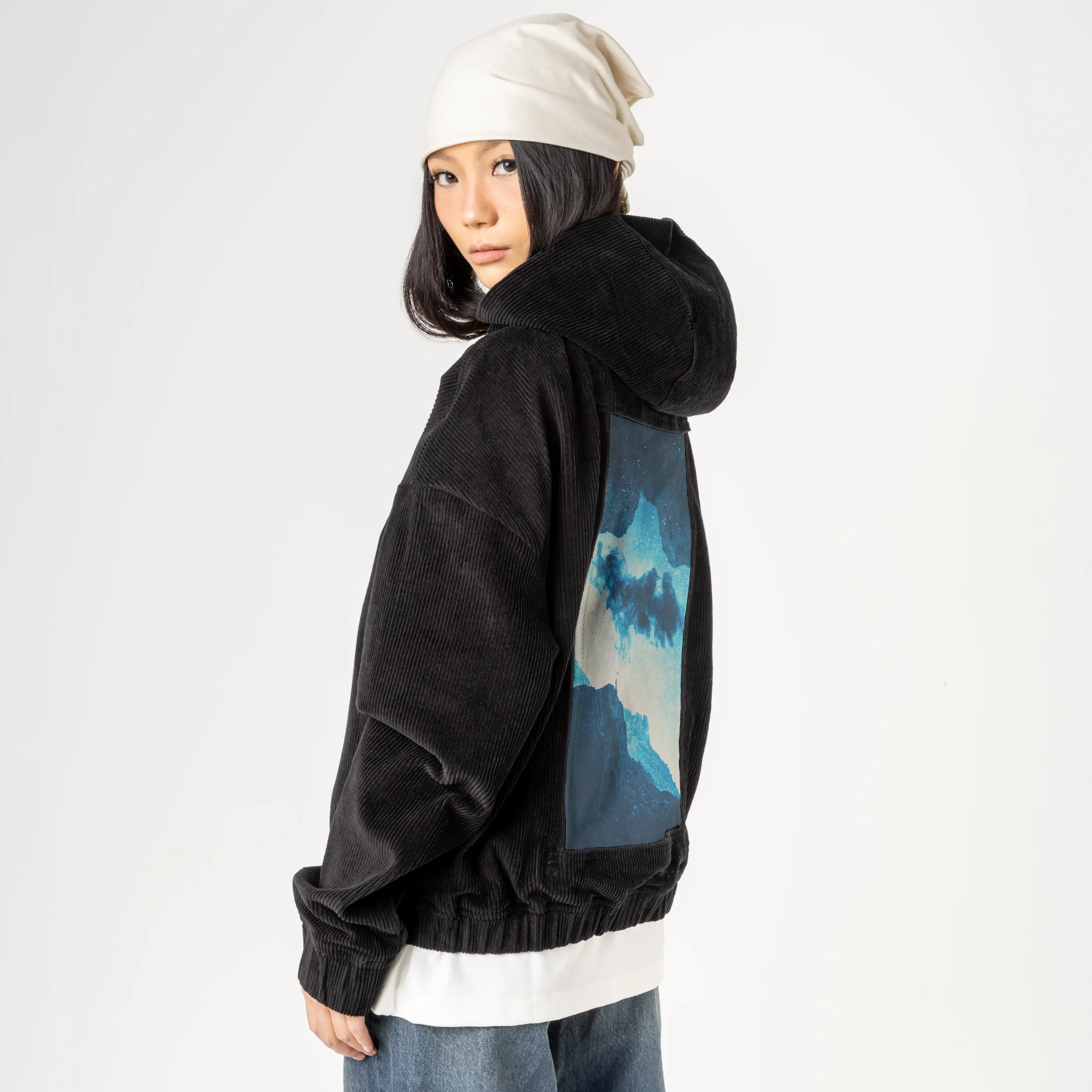 imaginaryworld patch on female retro cord hoodie in onyx